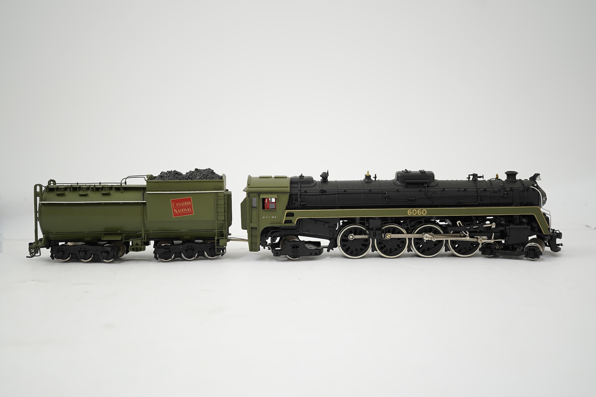 A boxed HO gauge VH Scale Models model of Canadian National Railways 6060, 4-8-2 locomotive with bogie tender, powered for two rail operation.